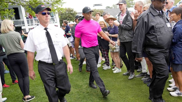 Tiger Woods walks at Augusta National prior to his opening round of the 2022 Masters.
